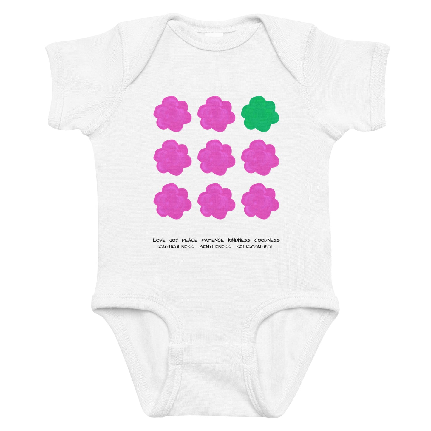 White baby onesie with pink and green flower designs on a white background